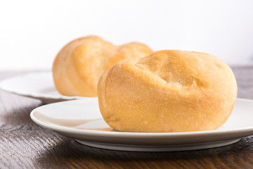 bun baking on a white plate or in a transparent bag on a white background
