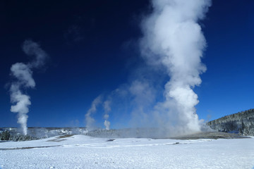 Yellowstone geysers in winter condition during sunny day