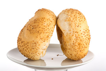 bun baking on a white plate or in a transparent bag on a white background