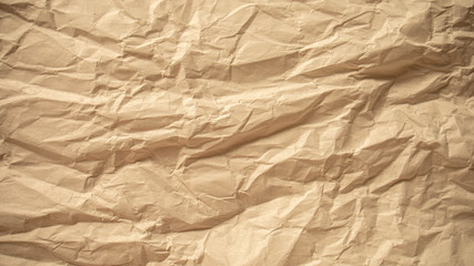 Brown crumpled paper close up texture background
