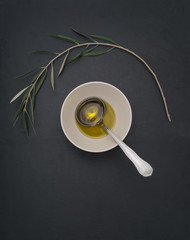 Olive oil premium presentation in a soft dark background