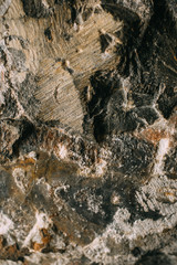 Natural rock wall texture and background. Closeup view of stone wall texture and background.