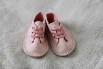 pink baby boots. Baby shoes.  top view, copy space