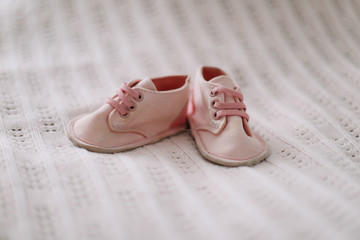 pink baby boots. Baby shoes.  top view, copy space