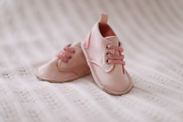 pink baby boots. Baby shoes.  top view, copy space