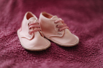 pink baby boots. Baby shoes.  top view, copy space