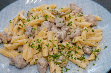 Italian pasta with meat, cheese, spices, parsley. Gourmet traditional food