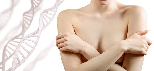 Young naked woman cover breasts among DNA chains.