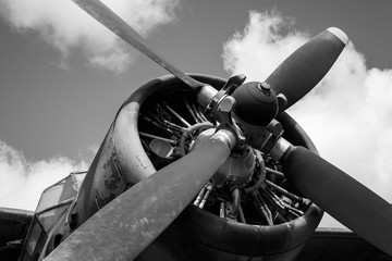 Propeller and engine of the old Soviet biplane. Black and white photo