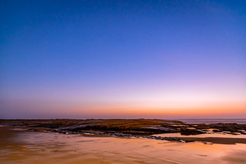 Fototapeta na wymiar Sunset in Algarve under clear starry skies