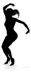 A woman dancer dancing in silhouette