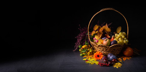 autumnal cornucopia in round basket