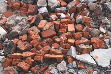 Pile of red bricks. Destruction, broken stone texture, old ruin. Debris.