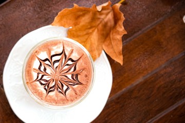 cup of hot chocolate with creamy milk