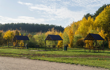  Free gazebo bower for relaxing in the autumn public park.