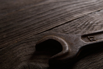 Different workpieces on a wooden background. Hedge wrenches keys, hammer