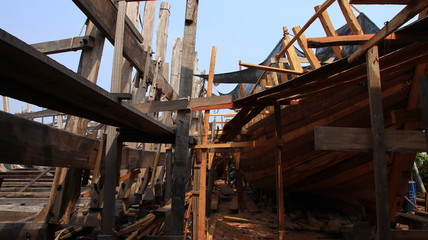 Timber shipbuilder working while working at a shipyard, Batang Indonesia, 14 October 2019
