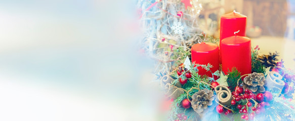 CHRISTMAS GREETING CARD, RED CANDLE WITH CHRISTMAS DECORATION AND WHITE EMPTY SPACE FOR TEXT