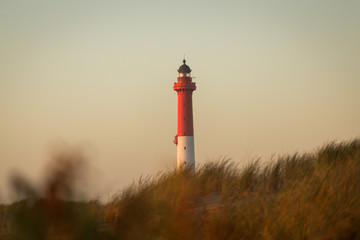 phare de la coubre au coucher de soleil sur la plage de la cote sauvage prés de royan la palmyre © tunach17