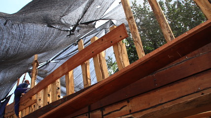 Timber shipbuilder working while working at a shipyard, Batang Indonesia, 14 October 2019