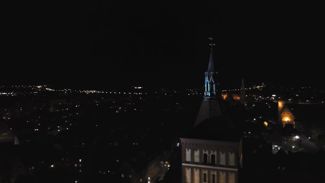 Aerial night View Of a city hall in Olsztyn Old Town, Poland