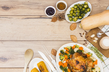 Wooden table covered with different food