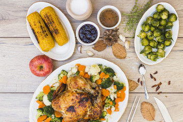 Wooden table covered with various food