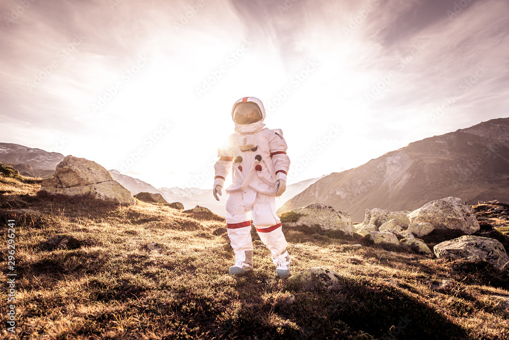 Poster astronaut exploring a new planet. searching for a new home for humanity. concept about science and n