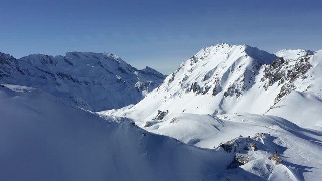 Tignes - Drone flight over snowy mountains Tignes - Val d'Isère