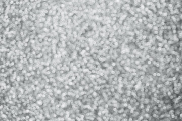 Abstract blur silver glitter sparkle defocused bokeh light background