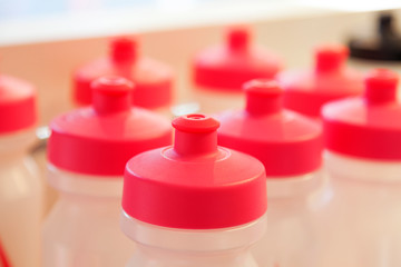 lots of plastic water bottles sold in a sports shop downtown