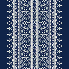 Woodblock printed indigo dye seamless ethnic floral wide geometric border. Traditional oriental ornament of India Kashmir, flowers wave and arcade motif, ecru on navy blue background. Textile design.