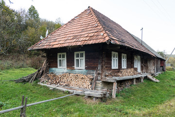 Fototapeta na wymiar Village wooden house in the forest