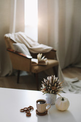 Autumn still life. Rustic style home decor. Still life details of living room. Autumn weekend concept. Fall home decoration.