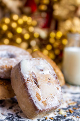 Traditional Christmas cookies with milk on christmas setting background