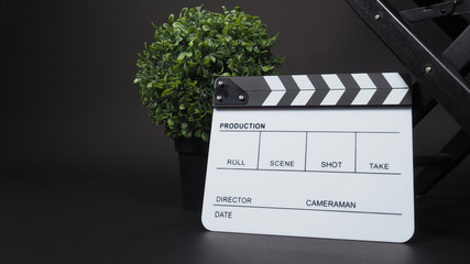 Clapperboard or clap board or movie slate with director chair use in video production ,film, cinema...