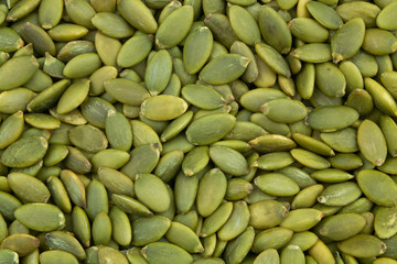 Roasted pumpkin seeds background 