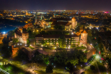 Fototapeta na wymiar Night aerial panorama of Wawel Hill in Cracow with old most famous polish castle