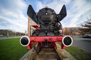 Steam locomotive in front of the main station, coal-fired German