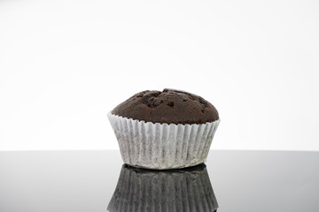 Delicious of chocolate chip cupcake isolated on black background