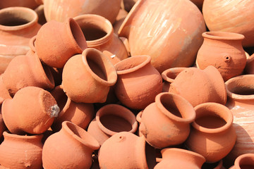 Fototapeta na wymiar Earthen pot being made using potter's wheel, India