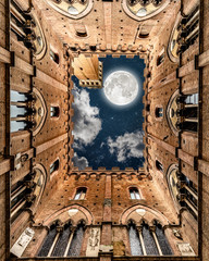 Night Sky With Moon Seen from Inside A Building In Siena Italy