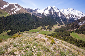 Fototapeta na wymiar Caucasus Mountains landscape. View from the Muhu Pass, Karachay-Cherkessia