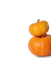 A stack of pumpkins isolated on white background with copy space.