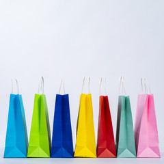 Group of colourful bags displayed in a row