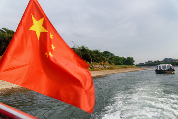 Closeup view of the flag of China fluttering on boat