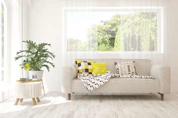 Stylish room in white color with sofa and summer landscape in window. Scandinavian interior design. 3D illustration