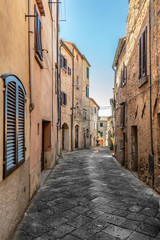 Fototapeta na wymiar Old Stone Buildings on Alleys in Tuscany Italy