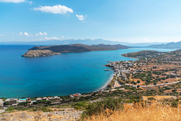 Fototapeta na wymiar Spinalonga Island, Crete, Greece. October 2019. An overview of the former leper colony, Spinalonga on the Mirabella Sea, off of Plaka, Crete.