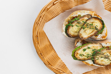 Delicious bruschettas in wicker baskets– stock image